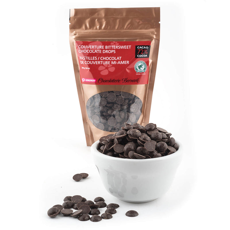 250g gusseted bag of chocolate chips with a white bowlful in foreground