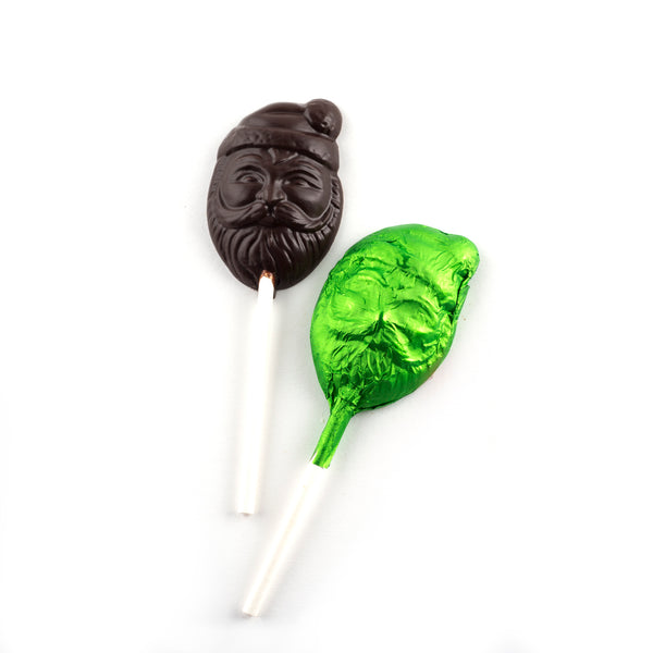 Two dark chocolate lollipops, one with green foil