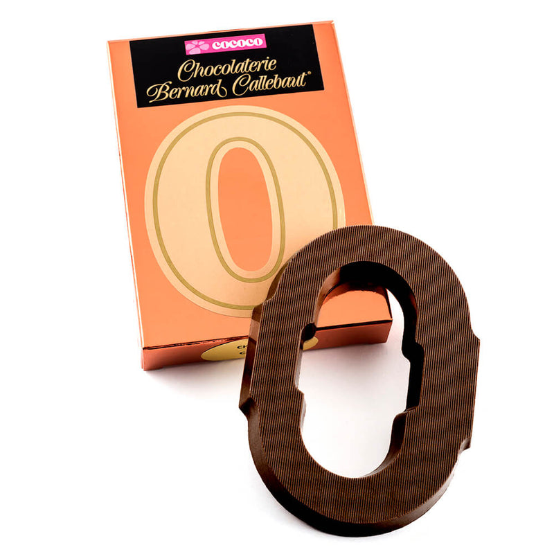 Dark chocolate letter O on top of it's Chocolaterie Bernard Callebaut®  box