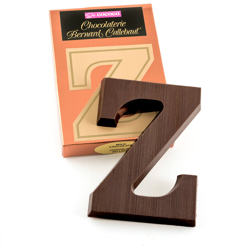 Dark chocolate letter Z on top of it's Chocolaterie Bernard Callebaut®  box