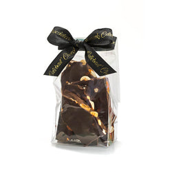 Cello bag of dark chocolate nut bag tied with Chocolaterie Bernard Callebaut® branded black ribbon