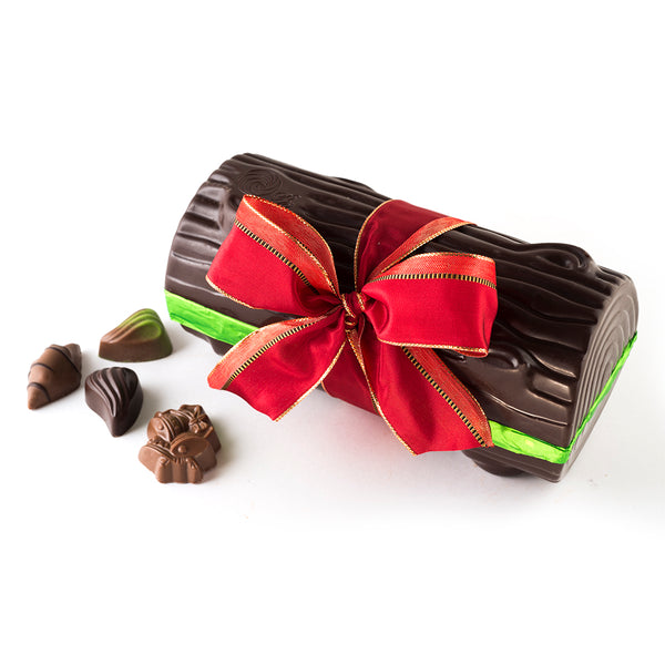 Dark Chocolate Yule Log with red ribbon