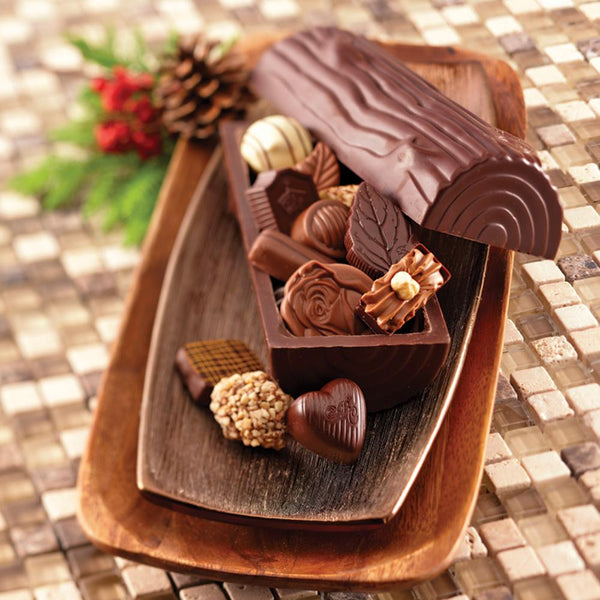 Milk chocolate Yule Log on a serving platter